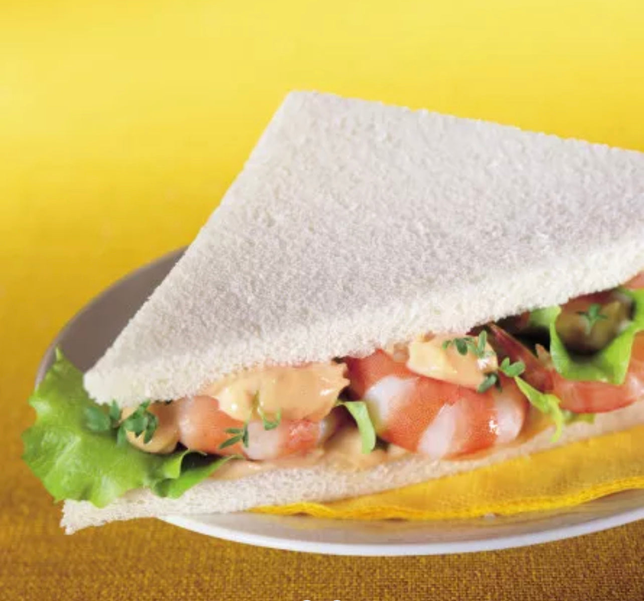Pan de sándwich sin corteza en plato largo - 1kg
